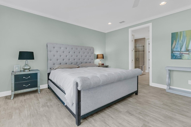 bedroom featuring visible vents, ornamental molding, baseboards, and wood finished floors