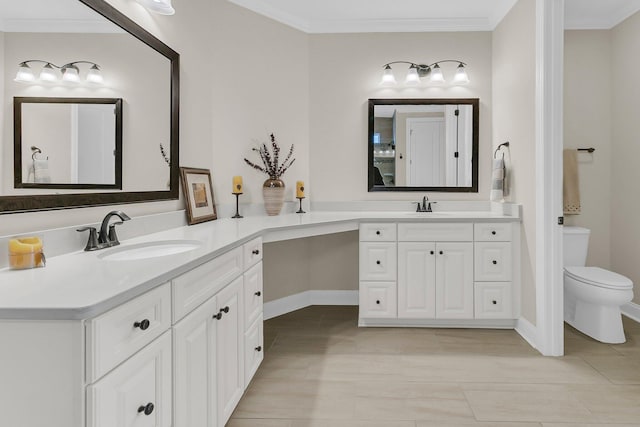 bathroom featuring toilet, vanity, and ornamental molding
