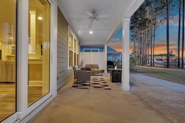 view of patio with ceiling fan