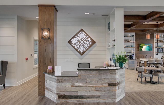 reception featuring a community bar and visible vents