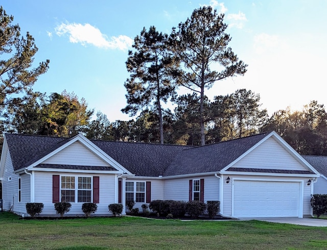 single story home with a garage and a front yard