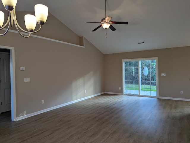 unfurnished living room featuring ceiling fan with notable chandelier, dark wood-type flooring, and high vaulted ceiling