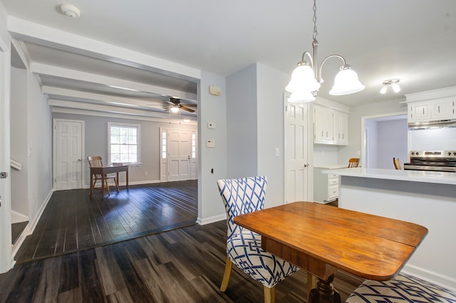 dining space featuring ceiling fan with notable chandelier and dark hardwood / wood-style floors