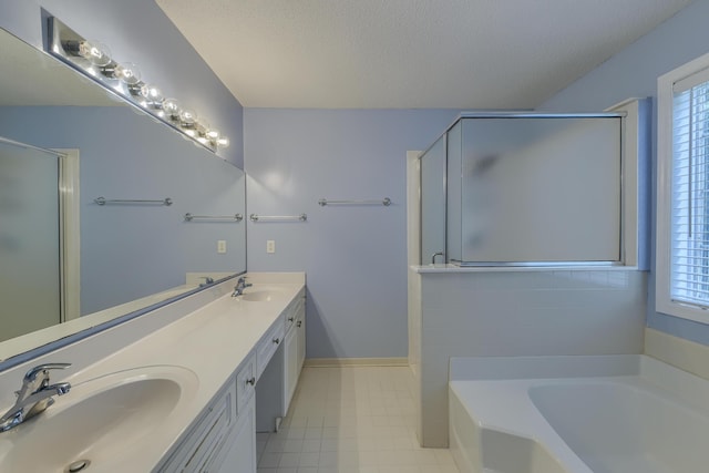 1616 Dotterers Run, Charleston, SC 29414 - bathroom with a bath, double vanity, healthy amount of natural light, a shower stall, and a textured ceiling