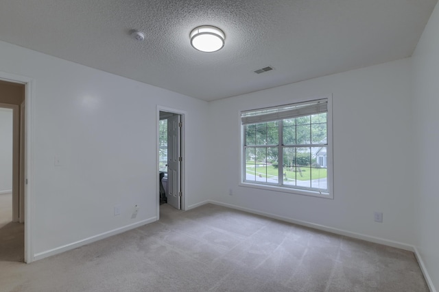 1616 Dotterers Run, Charleston, SC 29414 - empty room with carpet, a textured ceiling, and a smoke detector