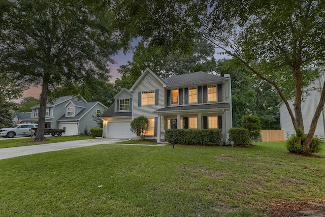 1616 Dotterers Run, Charleston, SC 29414 - view of front of home featuring concrete driveway, a chimney, a garage, and covered porch