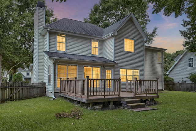 1616 Dotterers Run, Charleston, SC 29414 - back of property at dusk featuring a chimney, a wooden deck, a fenced backyard, and a shingled roof