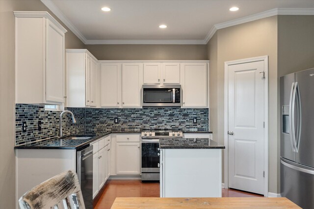 364 Deep River Rd, Summerville, SC 29486 - kitchen with a sink, appliances with stainless steel finishes, white cabinets, and light wood-type flooring