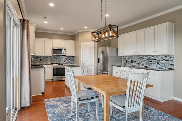 364 Deep River Rd, Summerville, SC 29486 - dining space with a chandelier, dark wood finished floors, ornamental molding, and visible vents