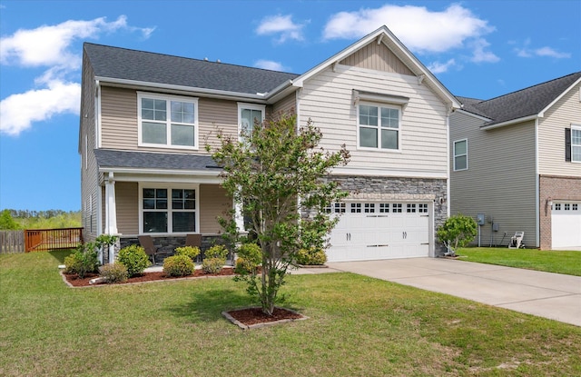 364 Deep River Rd, Summerville, SC 29486 - view of front facade with a garage, a front yard, stone siding, and concrete driveway