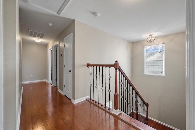 364 Deep River Rd, Summerville, SC 29486 - hallway with baseboards, an upstairs landing, visible vents, and hardwood / wood-style floors