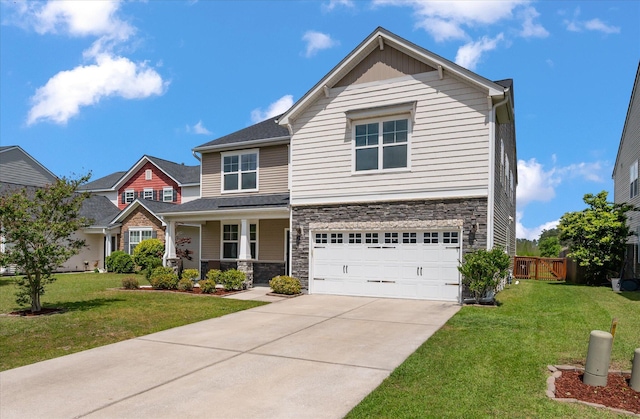 364 Deep River Rd, Summerville, SC 29486 - craftsman house with concrete driveway, an attached garage, fence, and stone siding