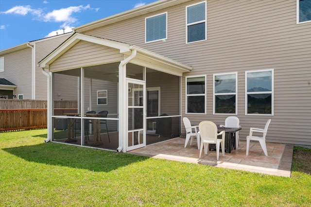 364 Deep River Rd, Summerville, SC 29486 - rear view of house featuring a lawn, a patio, fence, and a sunroom