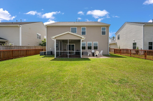 364 Deep River Rd, Summerville, SC 29486 - rear view of house featuring a sunroom, central AC unit, a fenced backyard, and a yard