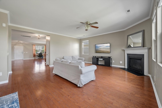364 Deep River Rd, Summerville, SC 29486 - living room featuring ceiling fan, a fireplace with flush hearth, wood finished floors, baseboards, and ornamental molding
