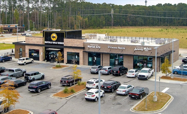 364 Deep River Rd, Summerville, SC 29486 - view of building exterior featuring uncovered parking and a wooded view
