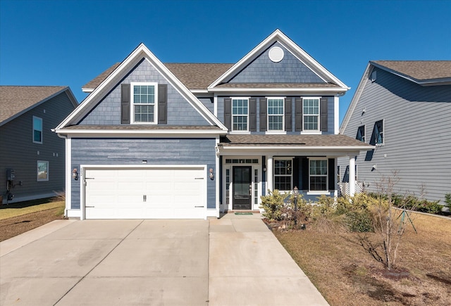 craftsman house featuring a garage