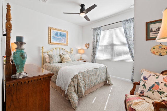 bedroom featuring carpet floors, baseboards, and a ceiling fan