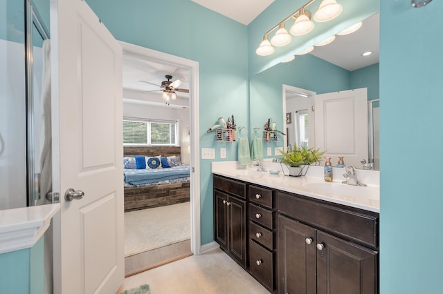 bathroom featuring vanity and ceiling fan