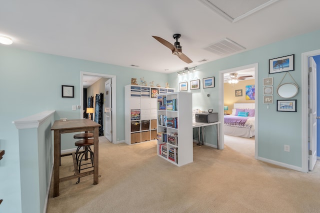 interior space featuring ceiling fan