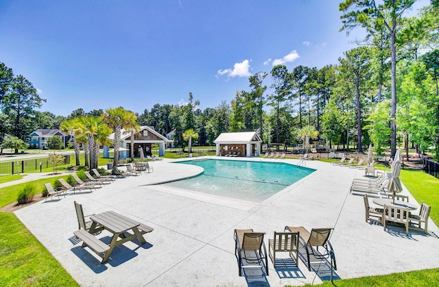 view of pool featuring a gazebo, a patio area, and a lawn