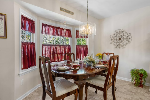 dining room featuring an inviting chandelier