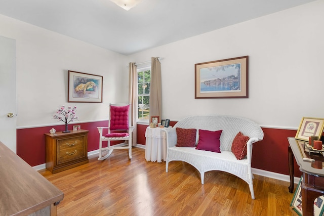 living area with light hardwood / wood-style flooring