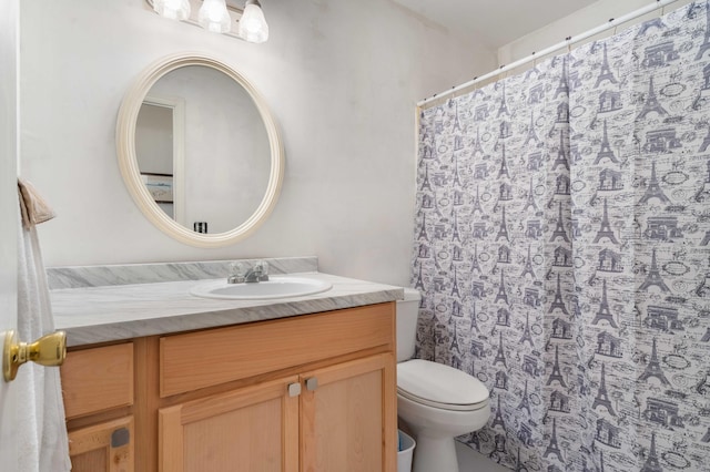 bathroom with vanity and toilet