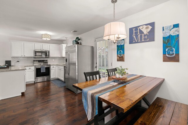 214 Blackstone Dr, Moncks Corner, SC 29461 - dining space with dark wood finished floors