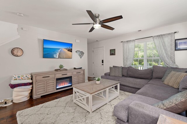 214 Blackstone Dr, Moncks Corner, SC 29461 - living room featuring ceiling fan, wood finished floors, a glass covered fireplace, and baseboards