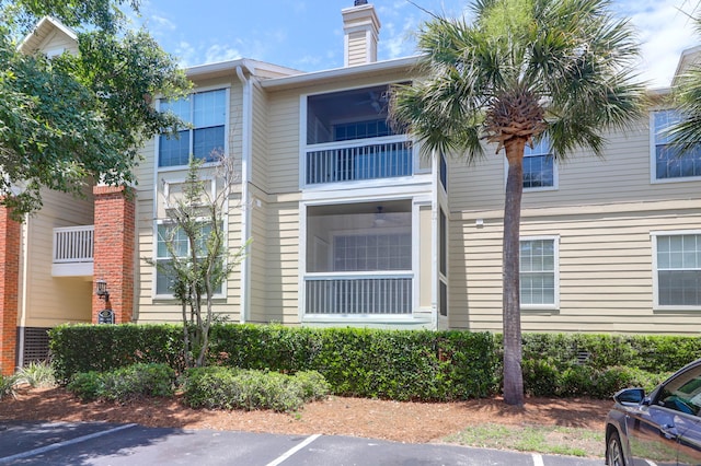 1600 Long Grove Dr Unit 423, Mount Pleasant, SC 29464 - view of property featuring uncovered parking