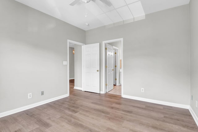 1600 Long Grove Dr Unit 423, Mount Pleasant, SC 29464 - unfurnished bedroom featuring wood finished floors, ensuite bathroom, and ceiling fan