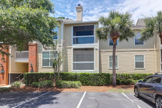 1600 Long Grove Dr Unit 423, Mount Pleasant, SC 29464 - view of building exterior with uncovered parking