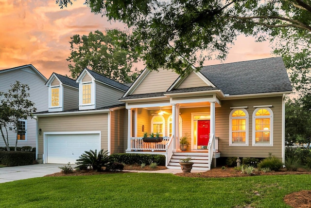 1809 Two Cedar Way, Mount Pleasant, SC 29466 - view of front facade featuring a porch, driveway, a garage, a lawn, and roof with shingles