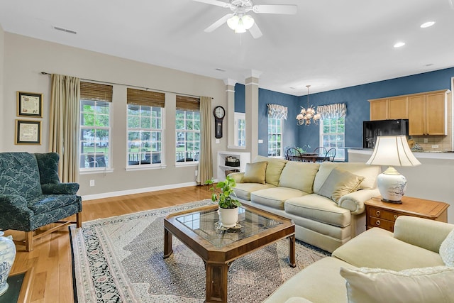 1809 Two Cedar Way, Mount Pleasant, SC 29466 - living area featuring light wood-style flooring, recessed lighting, a chandelier, and ceiling fan