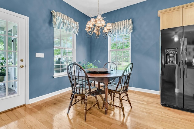 1809 Two Cedar Way, Mount Pleasant, SC 29466 - dining space featuring light wood finished floors and a chandelier