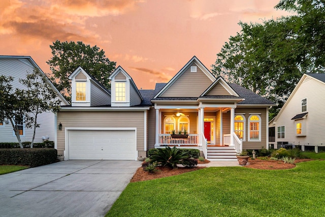 1809 Two Cedar Way, Mount Pleasant, SC 29466 - view of front facade with covered porch, concrete driveway, a front yard, and an attached garage