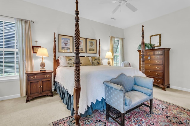 1809 Two Cedar Way, Mount Pleasant, SC 29466 - bedroom featuring light colored carpet, multiple windows, and a ceiling fan