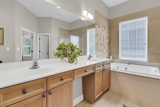 1809 Two Cedar Way, Mount Pleasant, SC 29466 - bathroom with double vanity, a shower stall, a garden tub, and tile patterned floors
