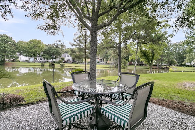 1809 Two Cedar Way, Mount Pleasant, SC 29466 - view of patio with outdoor dining space and a water view
