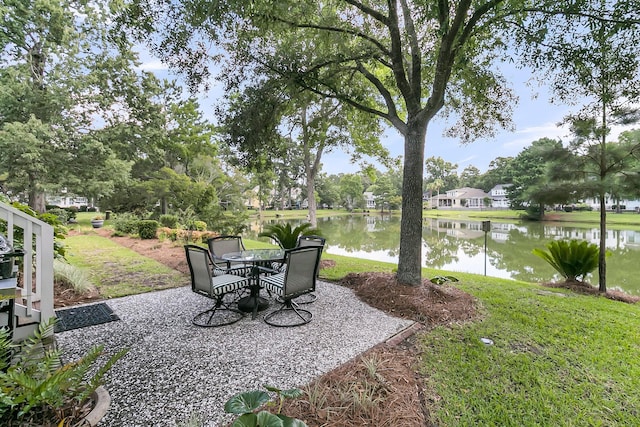 1809 Two Cedar Way, Mount Pleasant, SC 29466 - view of grassy yard featuring a water view, a patio, and outdoor dining area