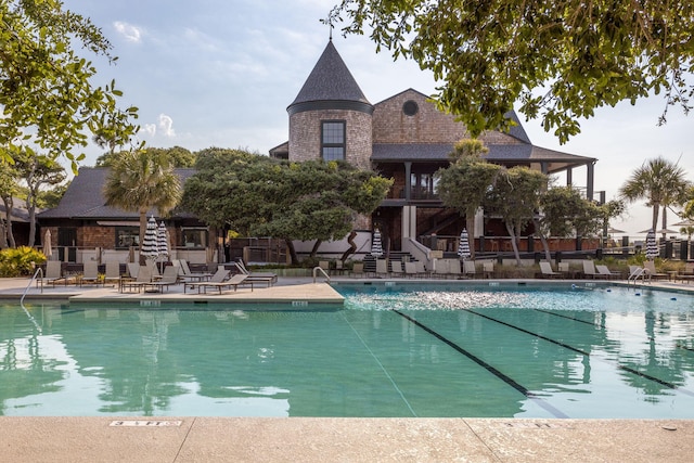 view of pool featuring a patio area