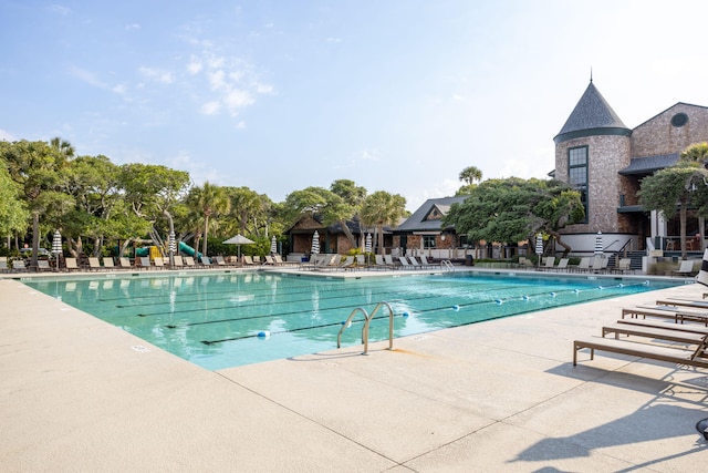 view of swimming pool featuring a patio