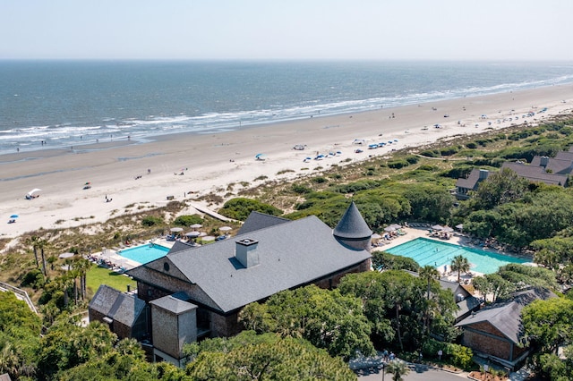 drone / aerial view with a view of the beach and a water view