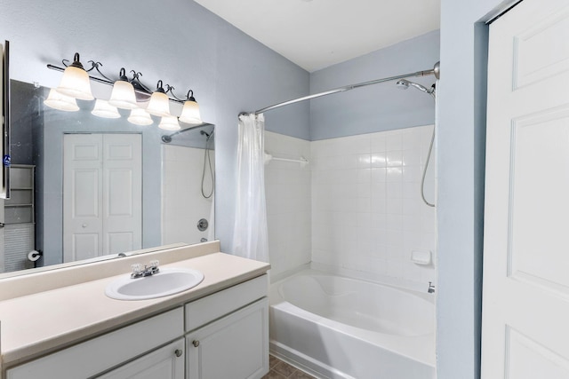 full bathroom with shower / bath combo with shower curtain and vanity