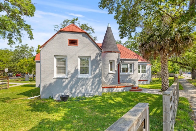 7 Wesley Dr, Charleston, SC 29407 - rear view of house featuring metal roof and brick siding