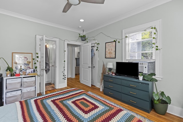 7 Wesley Dr, Charleston, SC 29407 - bedroom featuring wood finished floors, crown molding, baseboards, and a ceiling fan