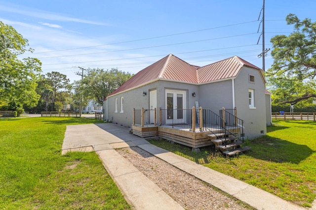 7 Wesley Dr, Charleston, SC 29407 - view of front of home with french doors, a deck, metal roof, and crawl space