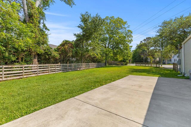7 Wesley Dr, Charleston, SC 29407 - view of yard with a patio and view of wooded area