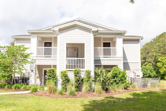 view of front of home with a front lawn